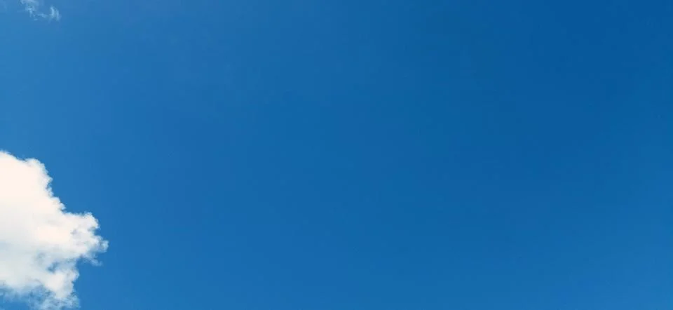 Blue sky with clouds b Stock Photos