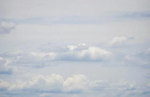 Blue sky with clouds background and texture. Stock Photos