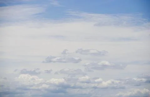 Blue sky with clouds background and texture. Stock Photos