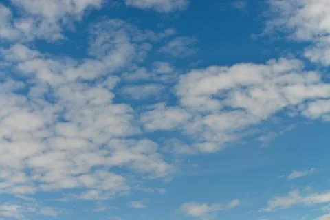 Blue sky with clouds background in beautiful summer day Stock Photos