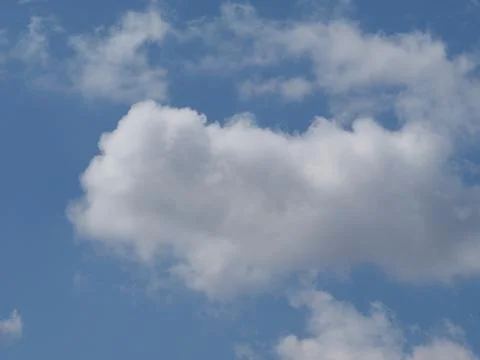 Blue sky with clouds background with copy space Stock Photos