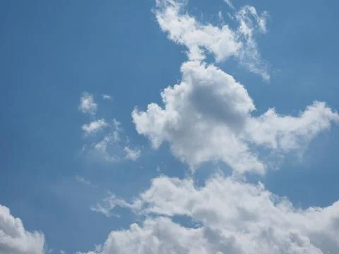 Blue sky with clouds background with copy space Stock Photos