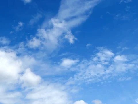 Blue sky with clouds background. It's beautiful and natural. Stock Photos