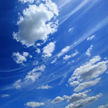 Blue sky with clouds as a background Stock Photos