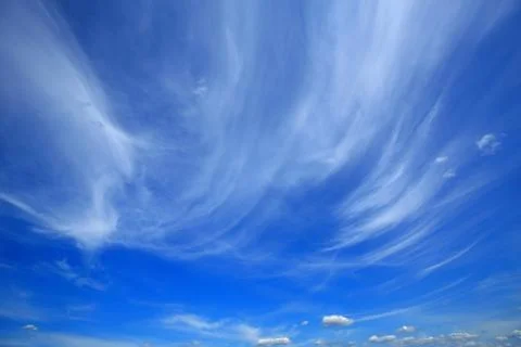 Blue sky with clouds as a background Stock Photos