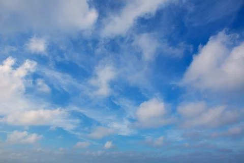 Blue sky with clouds background Stock Photos