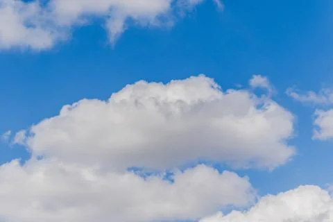 Blue sky with clouds (background) Stock Photos