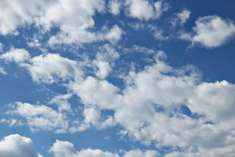 Blue sky with clouds background Stock Photos