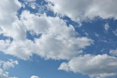 Blue sky with clouds background Stock Photos