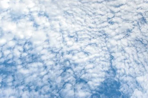 The blue sky with clouds, background Stock Photos