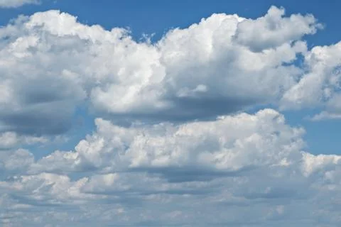 Blue sky with clouds background Stock Photos