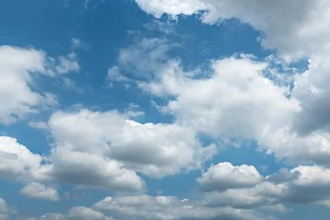 Blue sky with clouds background Stock Photos