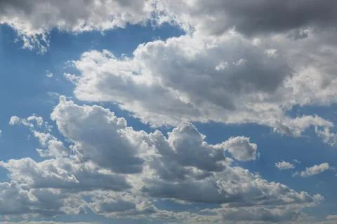 Blue sky with clouds background Stock Photos