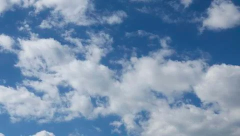 Blue sky with clouds background Foto stock