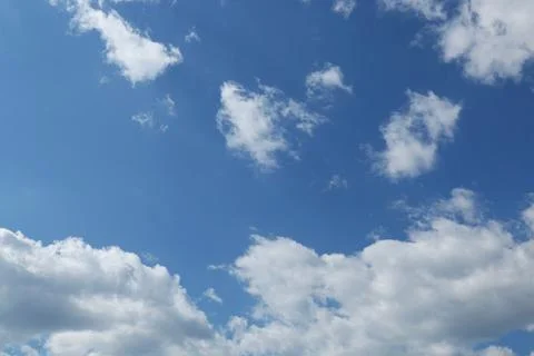 Blue sky with clouds background Stock Photos