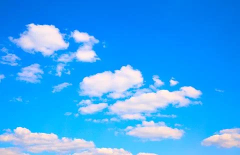 Blue sky with clouds background Stock Photos