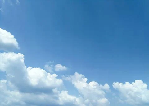 Blue sky with clouds background Stock Photos