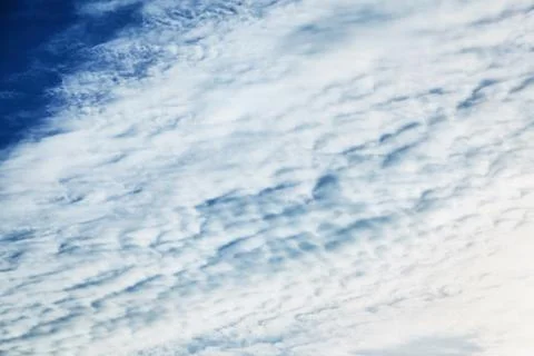 The blue sky with clouds, background Stock Photos