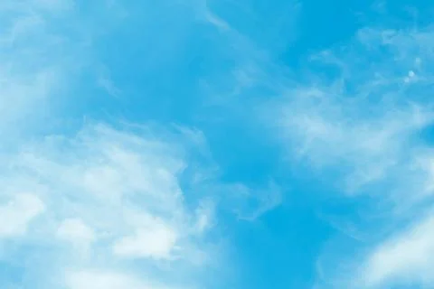 Blue sky with clouds background Stock Photos