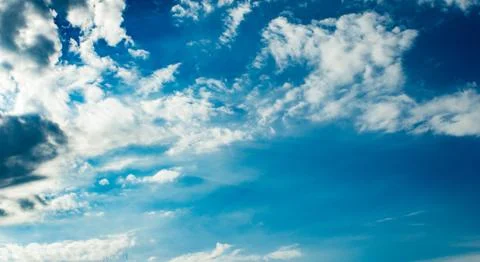 Blue sky with clouds, background Stock Photos
