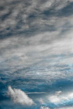 Blue sky in the clouds. Background. Stock Photos