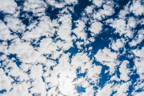 Blue sky with clouds background Stock Photos
