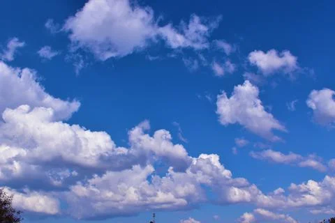 Blue sky with clouds background Stock Photos