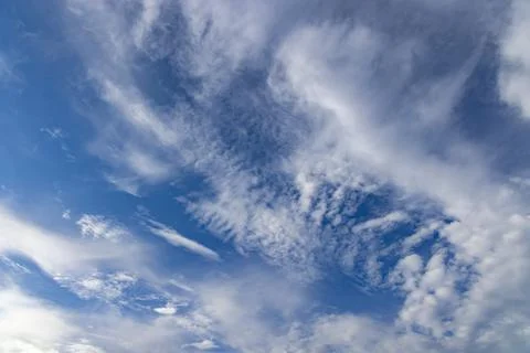 Blue sky with clouds as background Stock Photos