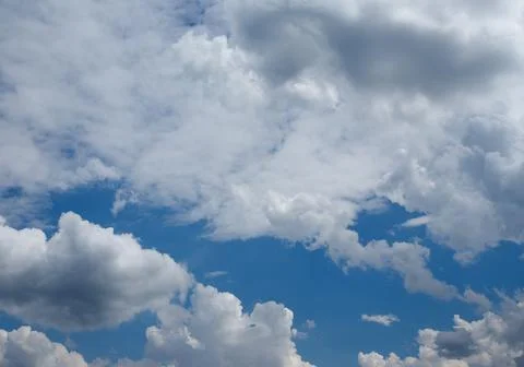 Blue sky with clouds background Stock Photos