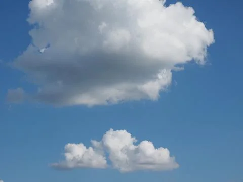 Blue sky with clouds background Stock Photos
