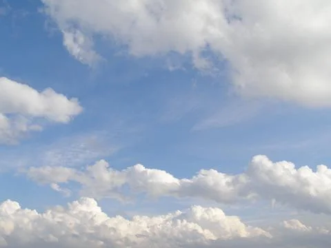 Blue sky with clouds background Stock Photos