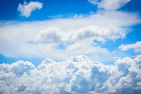 Blue sky with clouds background. Stock Photos