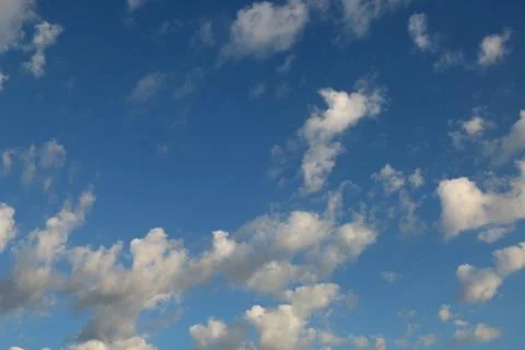 Blue sky with clouds background, sky with clouds. Stock Photos