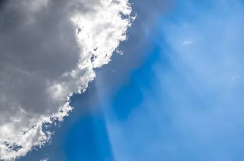 Blue sky with clouds background . sun rays Stock Photos