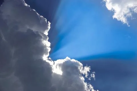 Blue sky with clouds background . sun rays Stock Photos