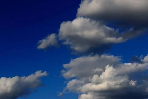 Blue sky with clouds Blue sky with dramatic clouds nature background ,mode... Stock Photos