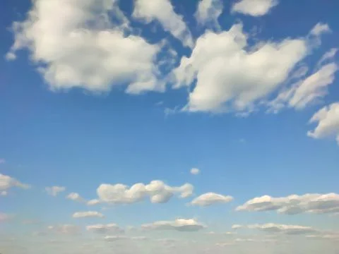 Blue sky with clouds with brush stroke effect Stock Illustration