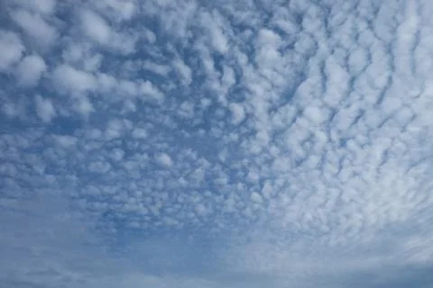 Blue sky with clouds closeup Stock Photos