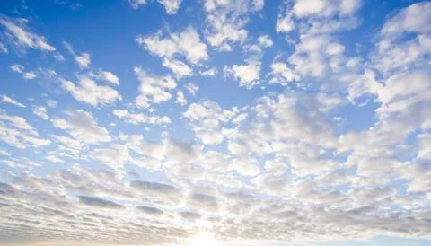 Blue sky with clouds closeup Stock Photos