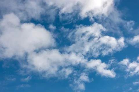 Blue sky with clouds closeup Stock Photos