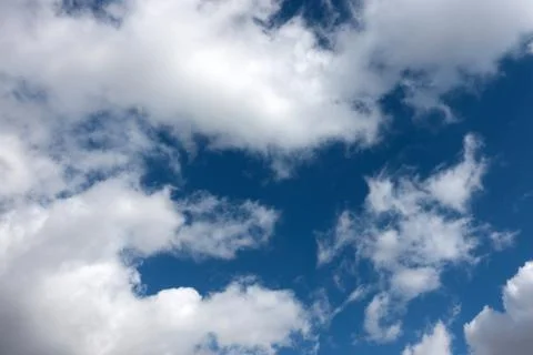 Blue sky with clouds closeup Stock Photos