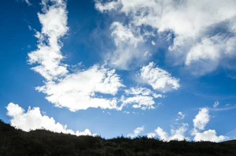 Blue sky with clouds closeup Stock Photos