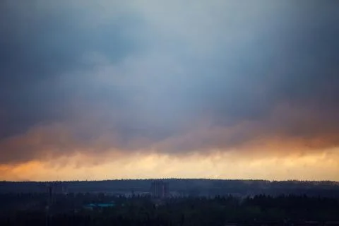 Blue sky with clouds. Clouds in the dark sky. Stock Photos