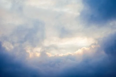 Blue sky with clouds. Clouds in the dark sky. Stock Photos