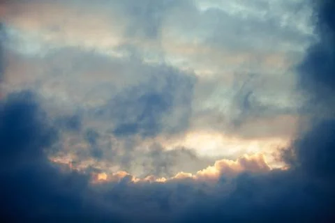 Blue sky with clouds. Clouds in the dark sky. Stock Photos