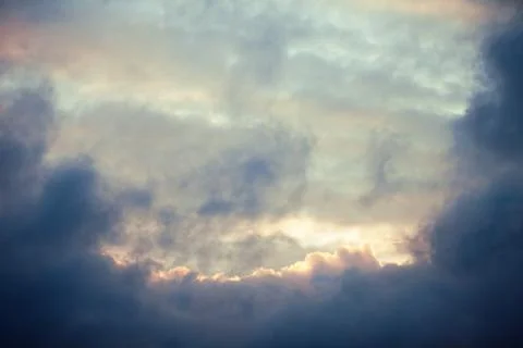 Blue sky with clouds. Clouds in the dark sky. Stock Photos