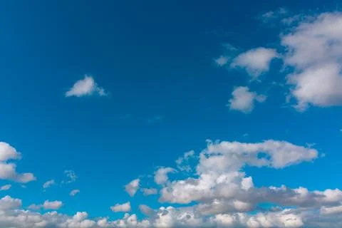 Blue sky with clouds. Cloudscape background photo. Stock Photos