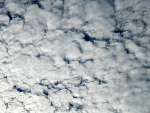 Blue sky with clouds at dawn Stock Photos