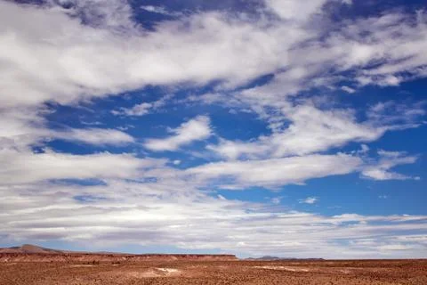 Blue sky with clouds in the desert Stock Photos