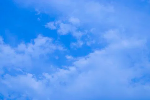 Blue sky with clouds, fluffy white cloud on air clear blue sky weather backgr Stock Photos